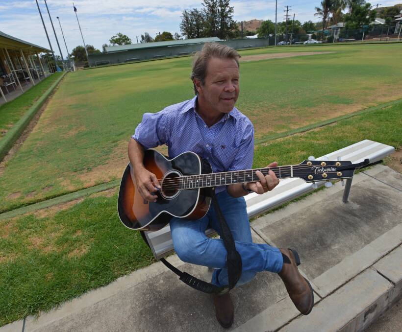 Butterflies: Troy Cassar-Daley takes a moment on Wednesday at the North Tamworth Bowling Club. Photo: Ben Jaffrey