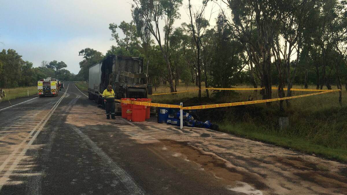 Big clean-up: Crews at the site of the truck fire on the New England Highway near Bendemeer. Photo: Fire and Rescue NSW Region North 3
