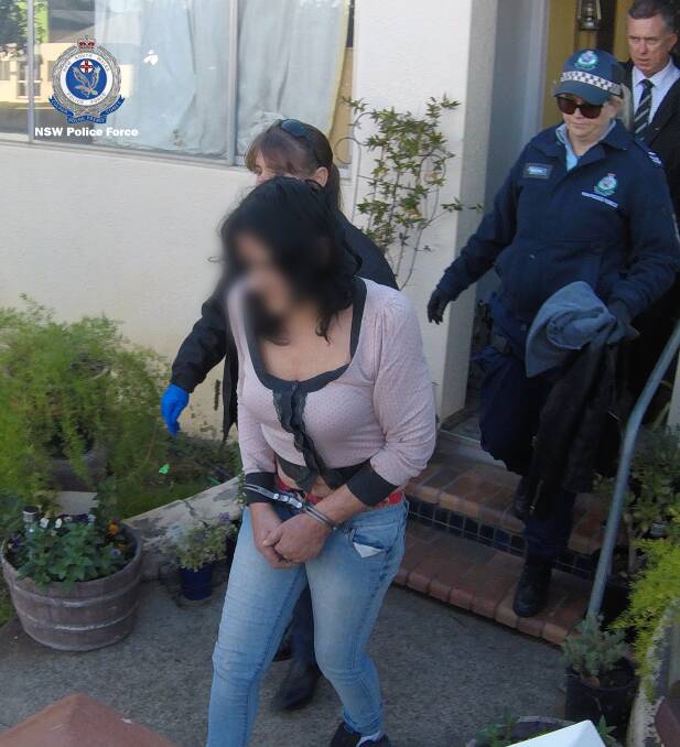 In custody: Sharon Strudwick is arrested in West Tamworth on May 30 by police from Strike Force Radius. Photo: NSW Police
