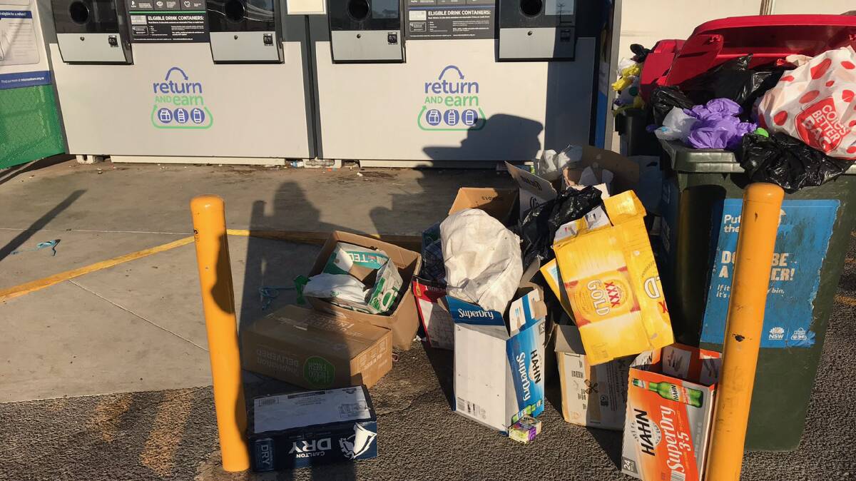 Dumping ground: The bins overflowing with rubbish at the Return and Earn reverse vending machine in Calala. Photo: Supplied