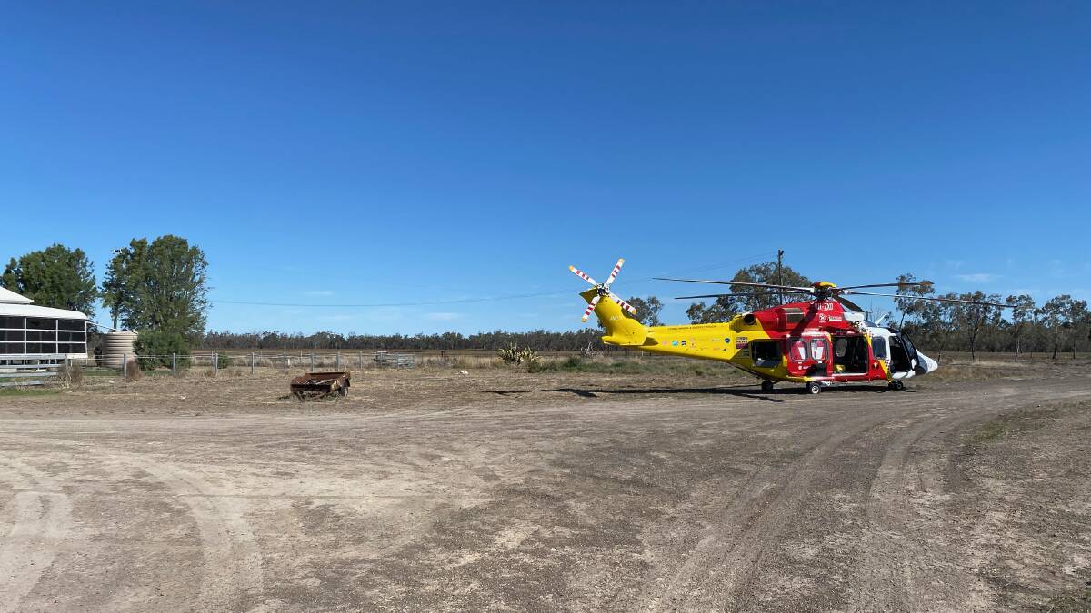 Crime scene: The Westpac Rescue Helicopter at the farm at Boomi near Moree on Saturday afternoon. Photo: The Westpac Rescue Helicopter
