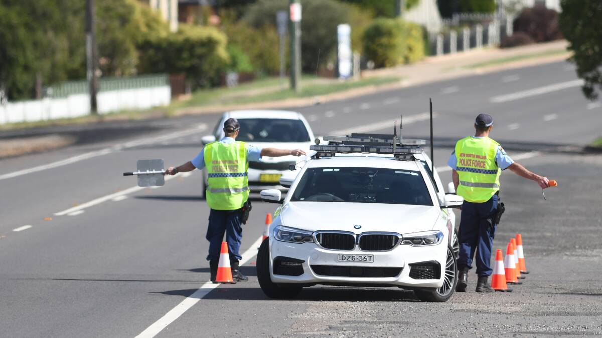 On patrol: Highway officers stop cars on the New England Highway in Tamworth as part of Operation Tortoise. Photo: Gareth Gardner 160419GGB05