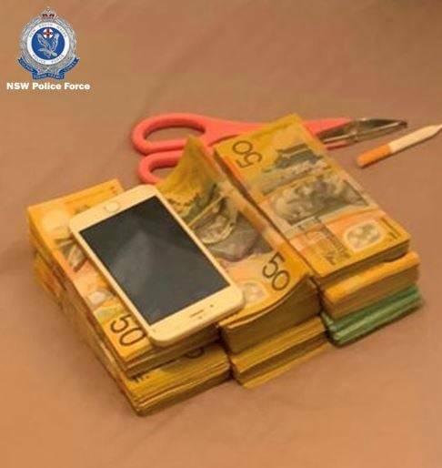 Seized: Some of the cash seized in Strike Force Kunderbung raids last week. Photo: Oxley Police