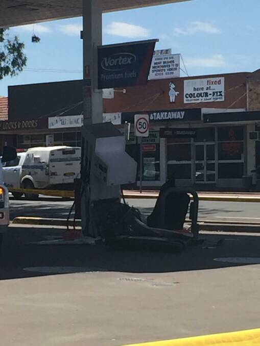 Petrol station cordoned off in Tamworth after car collides with petrol bowser.