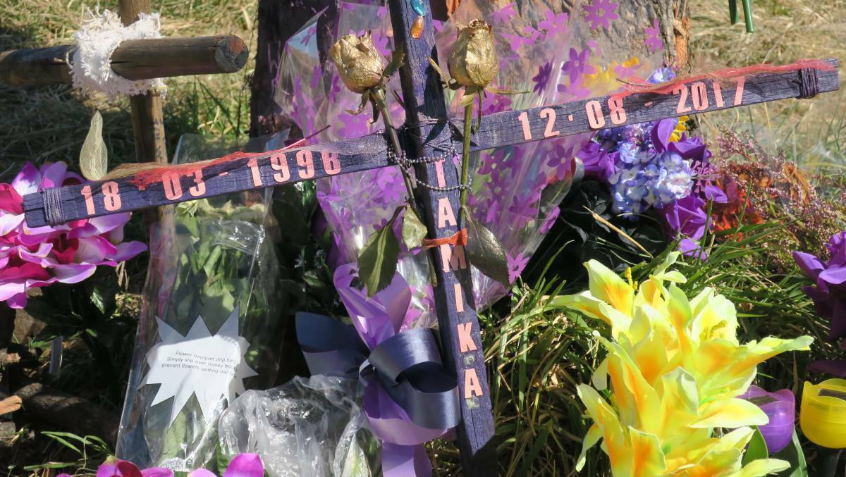 Tributes: The roadside memorial for Tamika Black-Atkins who died from her injuries after the deadly crash in August last year. Photo: Steve Evans