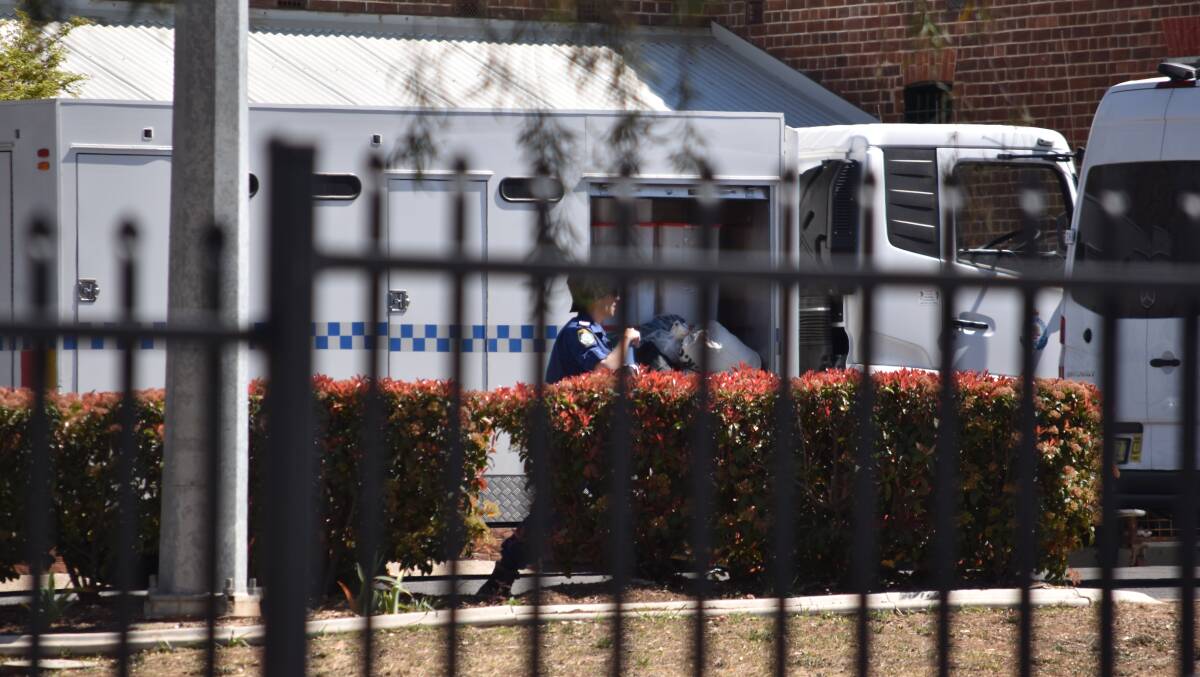 Police and prison staff at Tamworth jail on September 13 after the inmate escaped. Photo: Ben Jaffrey