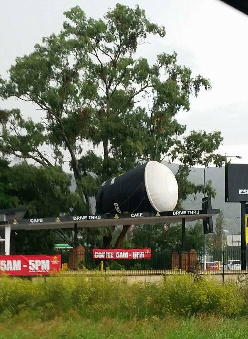 Big winds: The blow-up coffee cup in Bridge St. Photo: Ashleigh Adnett