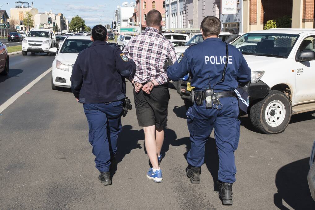 Four charged: The men, who were wanted on outstanding warrants, were arrested in West Tamworth and Oxley Vale on Thursday. Photo: Peter Hardin, file