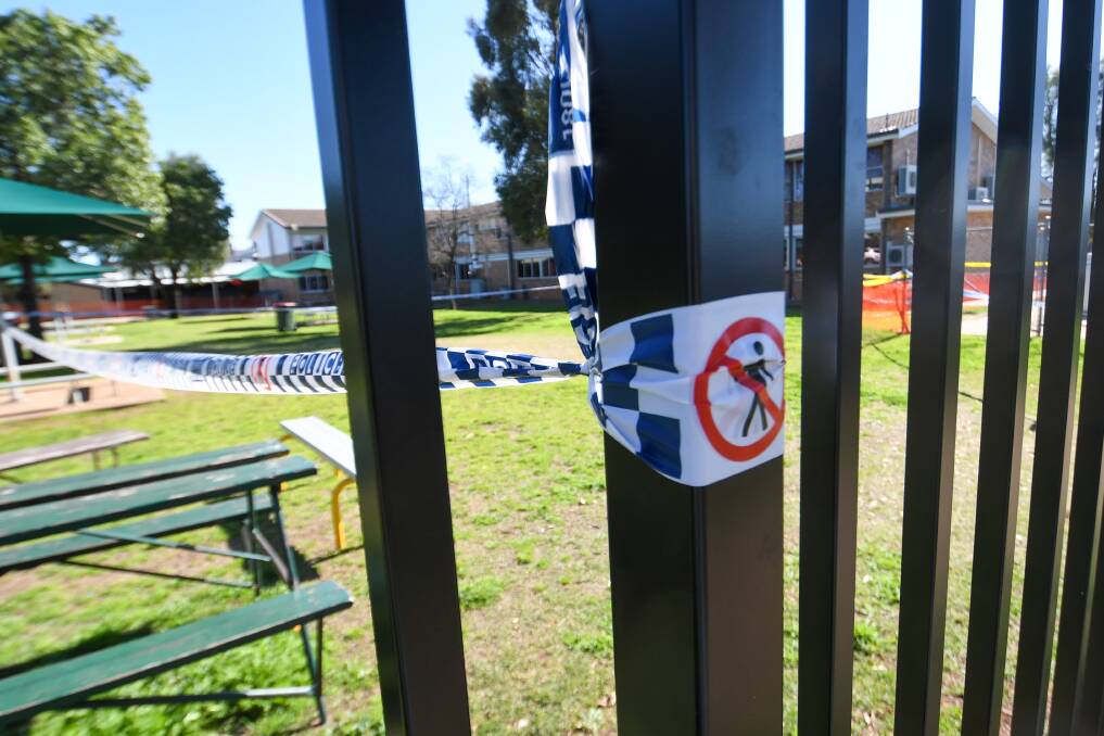 Police tape cordons off the crime scene at St Mary's school in Gunnedah. Picture by Gareth Gardner