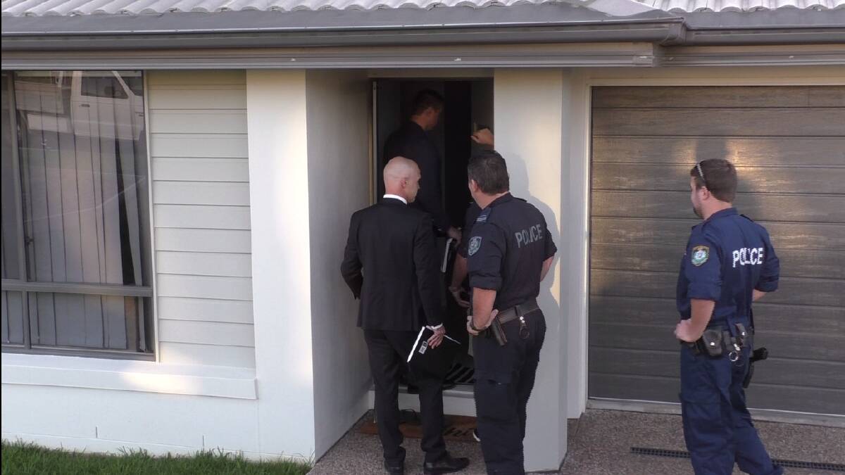 Major operation: Strike Force Janian police at the raid on a Schaefer Drive home in Armidale on Friday morning. Photo: NSW Police