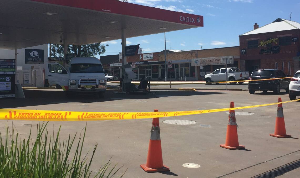 No go: The petrol station on Bridge St was cordoned off on Wednesday.
