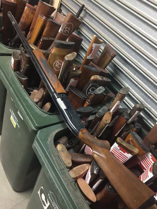 Massive haul: Some of the unregistered shotguns surrendered to Oxley police in Tamworth during the 2017 National Firearms Amnesty. Photo: File
