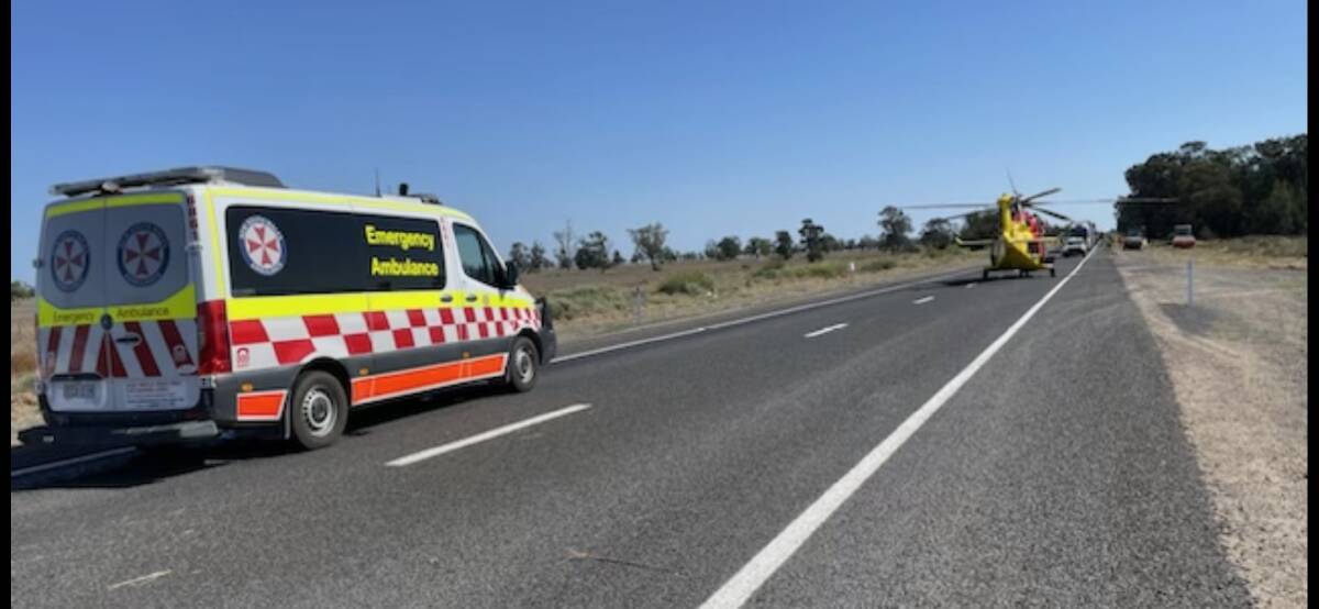 Emergency services at the crash site on the Newell Highway, north of Moree, on Monday morning. Picture supplied by the Westpac Rescue Helicopter