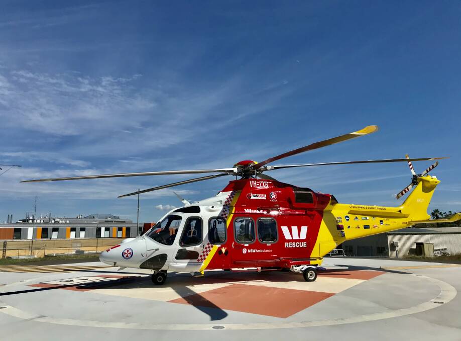 Mission: The Westpac Rescue Helicopter, pictured at Tamworth hospital on Monday, airlifted a 28-year-old woman to Royal North Shore Hospital. Photo: Westpac Rescue Helicopter Service