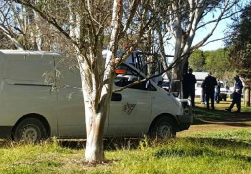 Crime scene: Forensic police and detectives at the property at Dangarsleigh near Armidale on Thursday morning where a 43-year-old man's body was discovered.