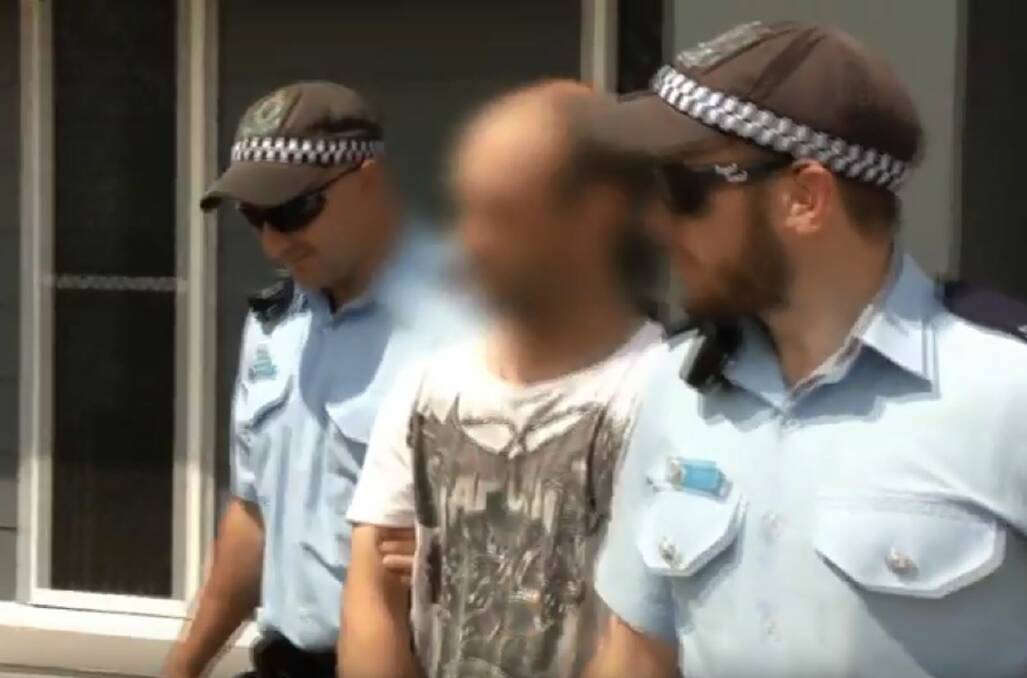 Bail revoked: Gregory Alan McBride is arrested by Oxley police from Strike Force Mewburn in March 2015 at a Westdale home. Photo: NSW Police