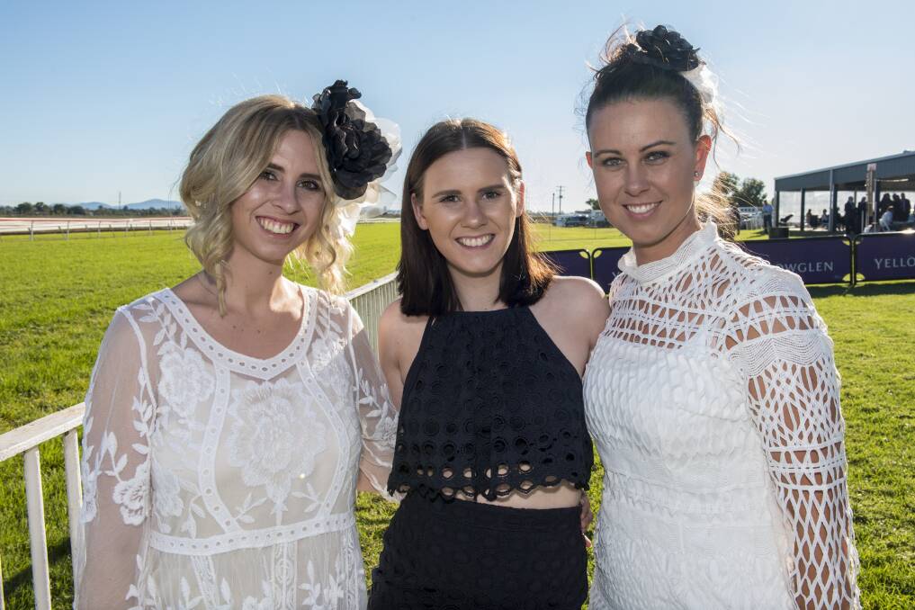Fashion fix: Charmayne Hopkins, Linley Armstrong and Codie Millgate head trackside for the Tamworth Cup. Photo: Peter Hardin