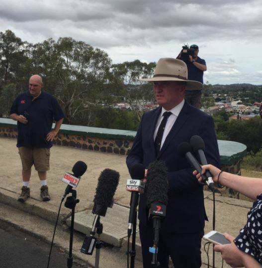 STEPPING DOWN: New England MP Barnaby Joyce in Armidale announcing his resignation as leader. Photo: Madeline Link