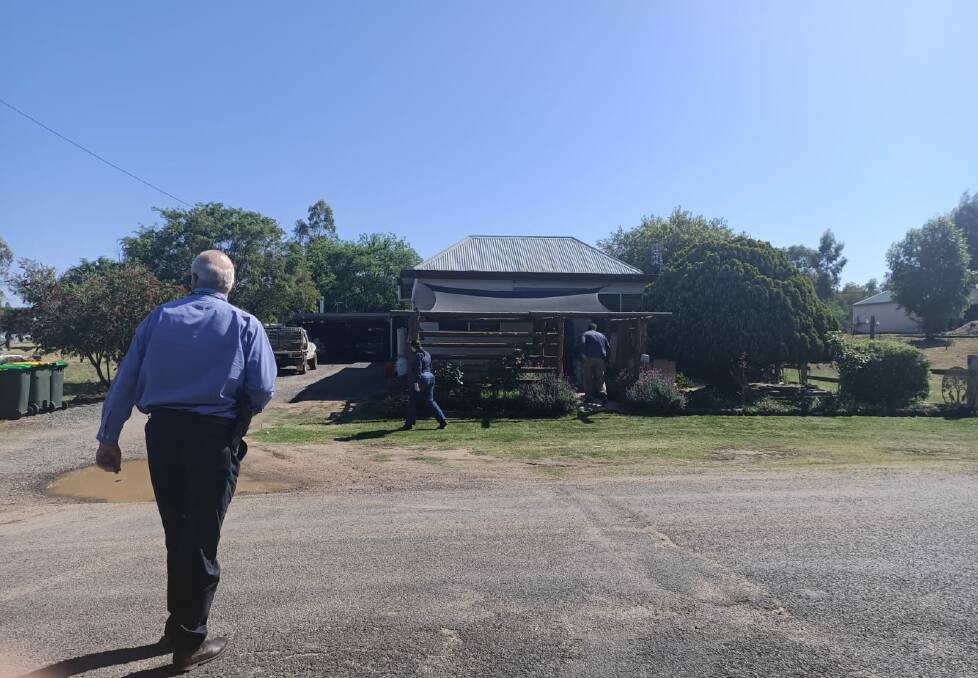 Police raid the Warialda home on Thursday as part of the long-running investigation. Photo: Supplied