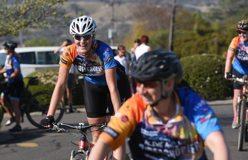 All smiles: Breanna Chillingworth, pictured behind Pauline Raffaele, after finishing the 2017 ride. Photo: Gareth Gardner