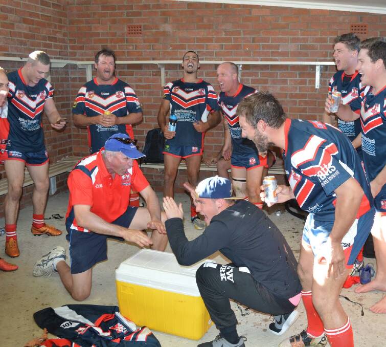 Rooster crow: Celebrations started in earnest in the Ashford post-match dressing room, where the significance of their win sank in after beating the Boomerangs.