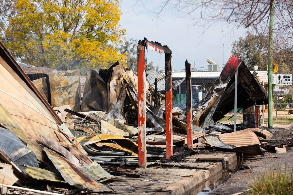 The rubble of Mungindi's supermarket, butcher shop and clothing store following Tuesday's fire. Photo: Adam Marshall