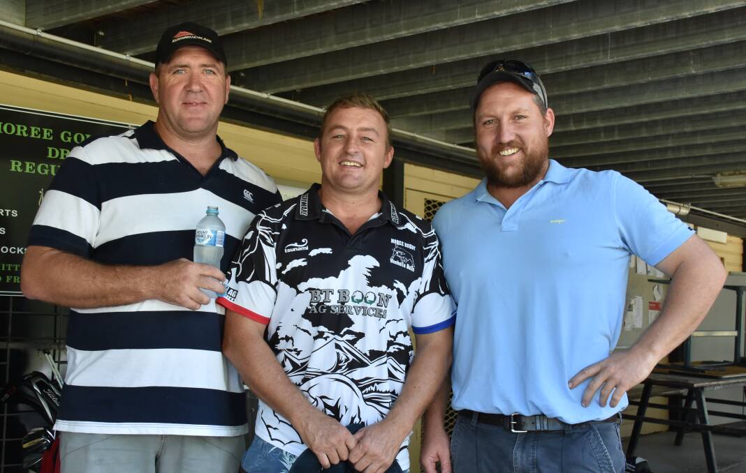 2019 first grade co-coaches Damien Kelly and Mick Grant with John Adams at last year's golf day.