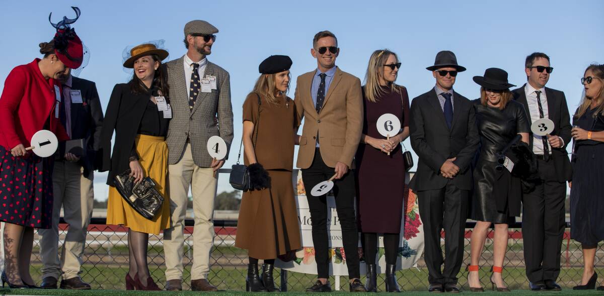 FASHIONS ON THE FIELD: A line up of last year's most stylish, including this year's judges Toy Barwick (fifth from left) and Sarah Kirkby (fifth from right).