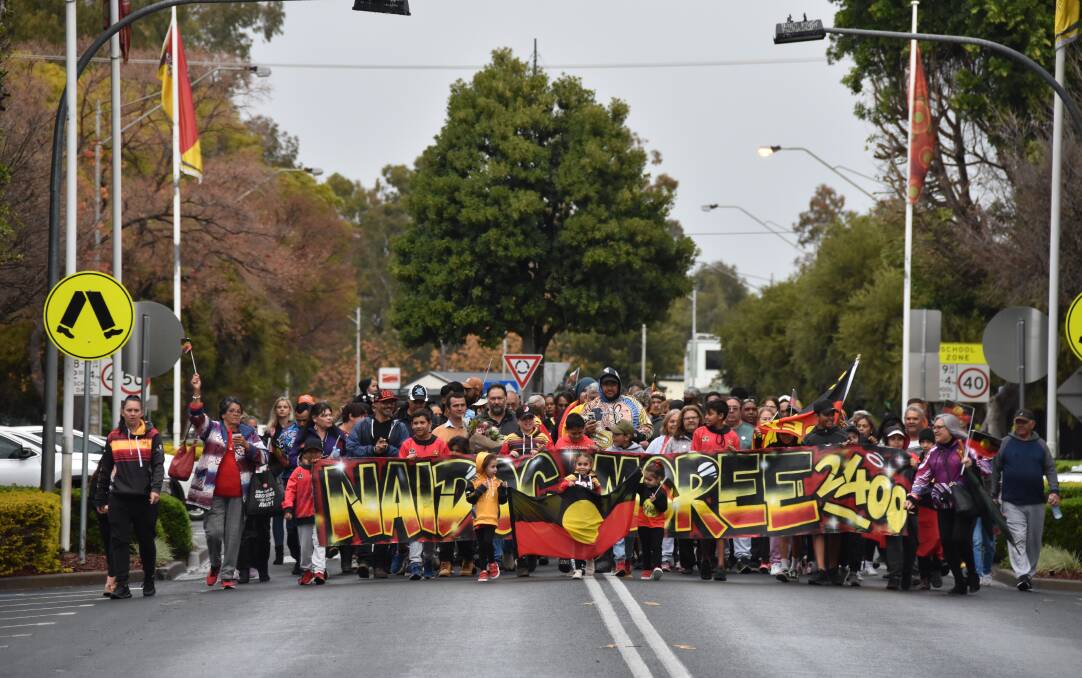 Coming together: The Moree community came together for a march during the official opening of NAIDOC Week on Monday.