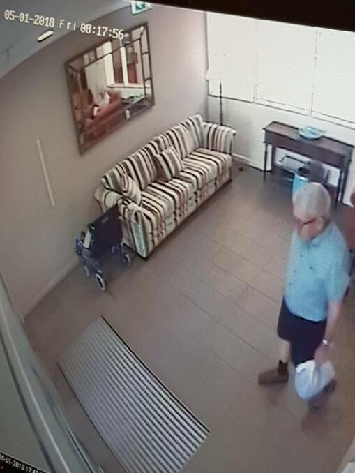 Police have released this CCTV image of William 'John' Torrens wearing the clothing he is believed to be last wearing – a green short sleeve shirt, navy blue shorts, brown shoes with black socks and carrying a plastic bag. 