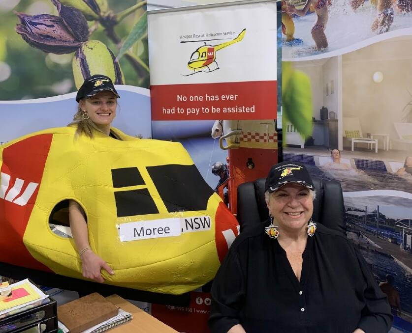 Tourism Moree's Brianna Harborne and mayor Katrina Humphries represented Moree in the barrier draw on Thursday. If the horse drawn in barrier four wins the Melbourne Cup on Tuesday, Moree will win $50,000 for its chosen charity - the Westpac Rescue Helicopter Service. Photo: supplied