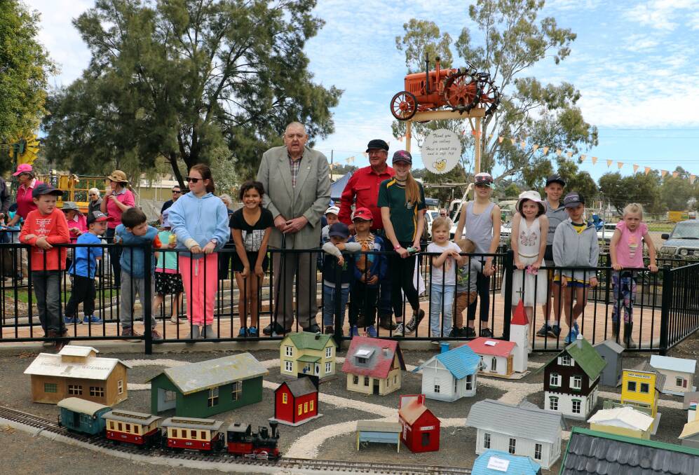 Don McDonagh, centre, with local kids at the exhibit opening of the refreshed miniature railway at the museum in late 2017. Photo: Ann Thomas