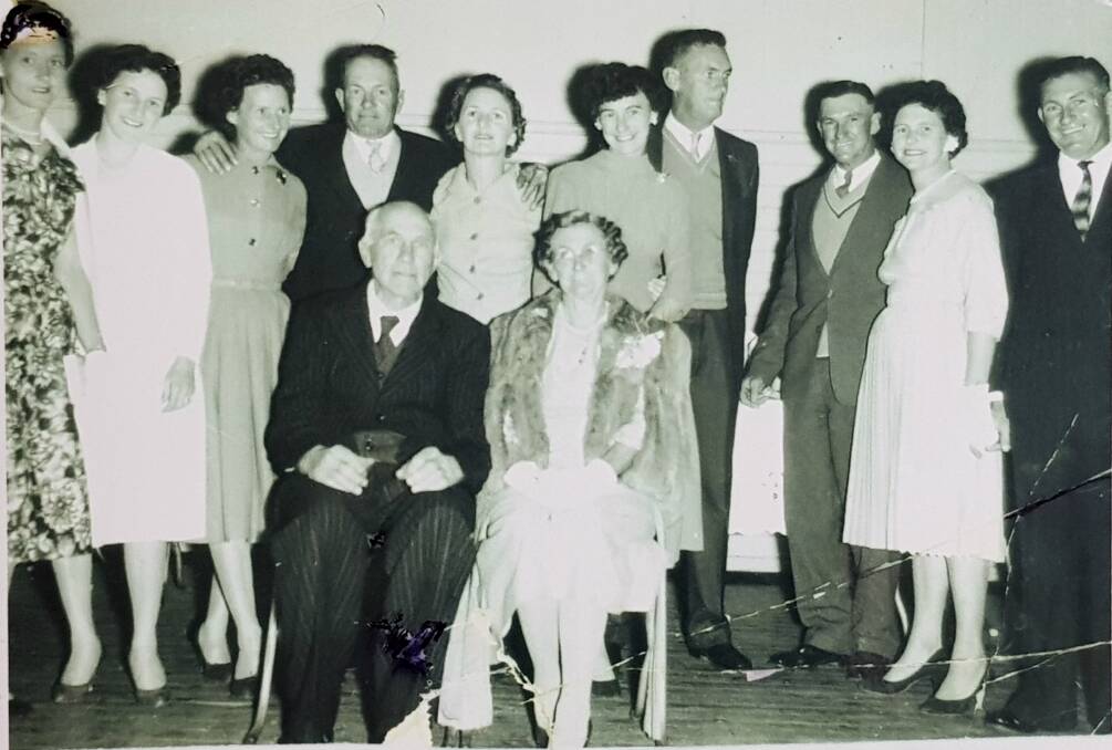 Walter and Janet Law (front) with their 10 children, including Harold, their eighth child.