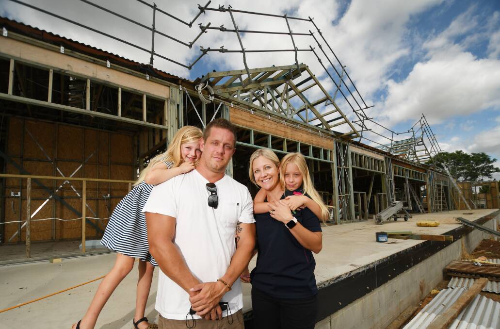 Li'l Achievers' owners, Richard and Brooke Patriquin with their daughters Annika (6) and Emmesyn (9) on the site of the centre's second expansion. Photo: Gareth Gardner