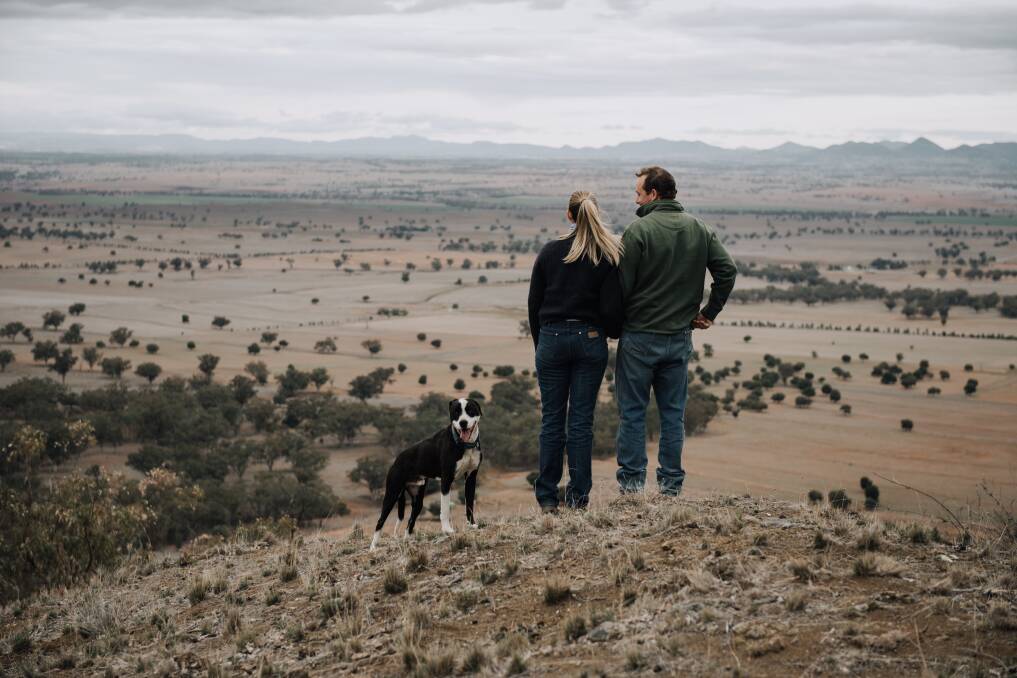 BROWN LAND: Julia and Tom Chaffey looking out over their dry paddocks in the Peel Valley between Attunga and Somerton. Photo: Finishing Image Photography