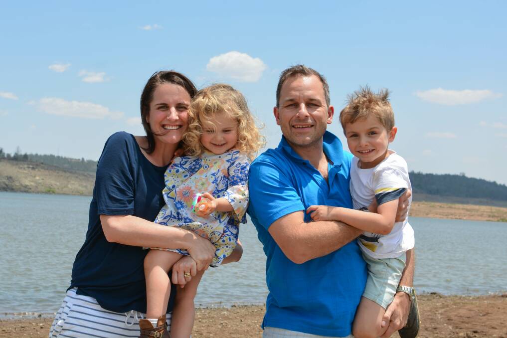 Bronwyn and Andrew Zbik at Lake Keepit, with their two eldest children Addelyn and Will, during a drought visit in 2019.