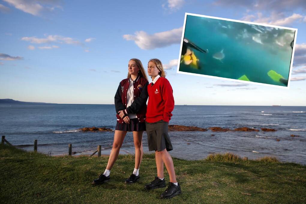 Incredible experience: Taia and Baxter Hanley came within two metres of a large shark while swimming at Bulli Point. Picture: Adam McLean. Inset: The shark captured on video.