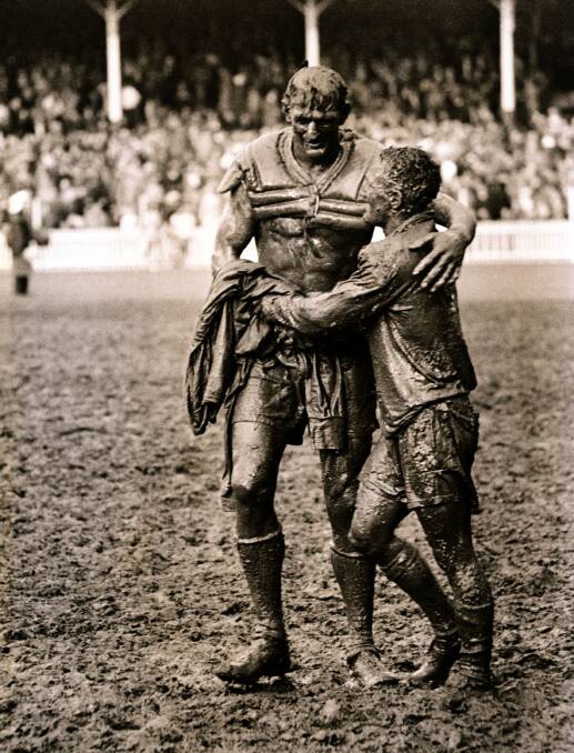 THE GLADIATORS: The iconic photo of Norm Provan and Arthur Summons after the 1963 grand final.