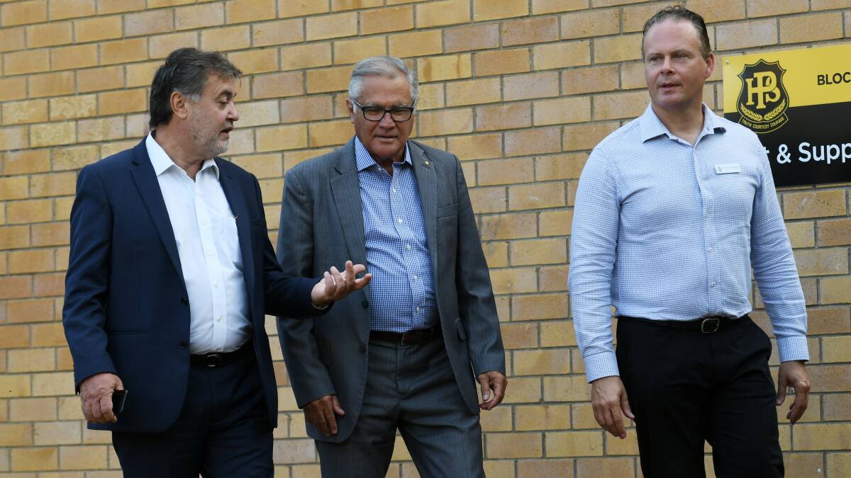 TOURING: NSW Teachers Federation President Angelo Gavrielatos and Gallop Inquiry commissioner Dr Geoff Gallop with the Federation's country organiser Mercurius Goldstein at Peel High School on Wednesday.