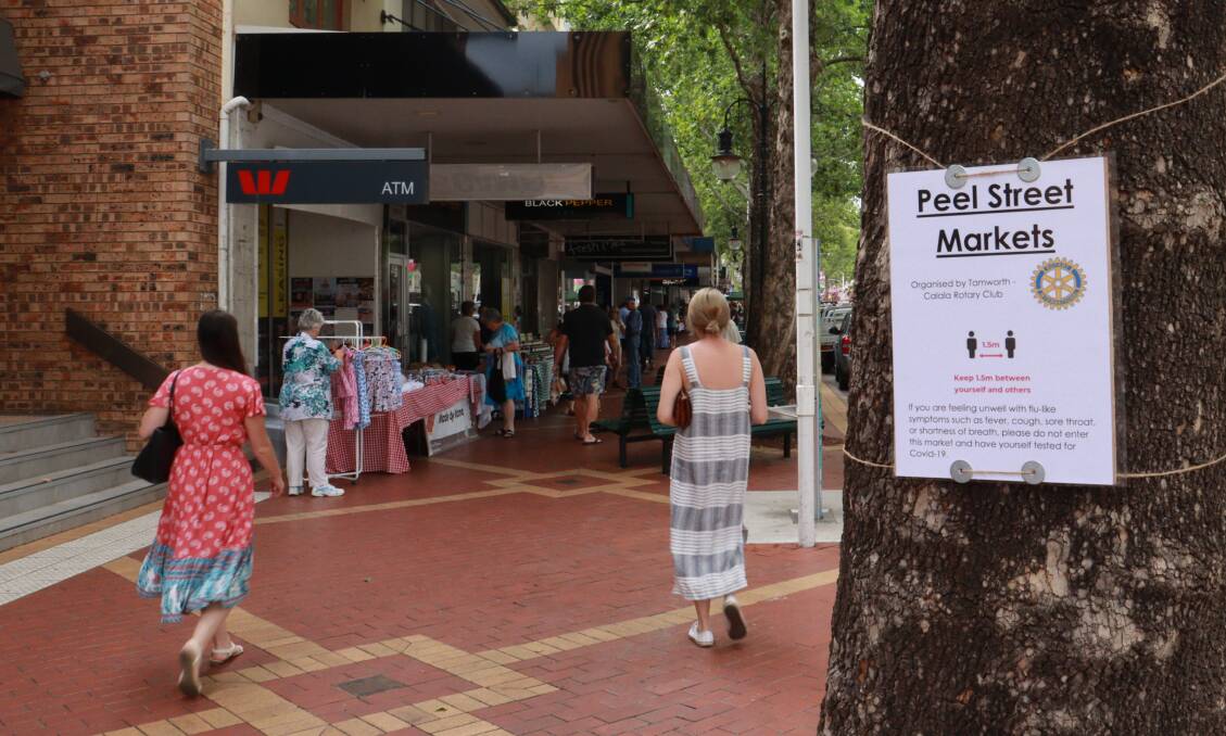 BACK: People hit the streets for the first Peel Street Markets held since January. Photo: Jacinta Dickins