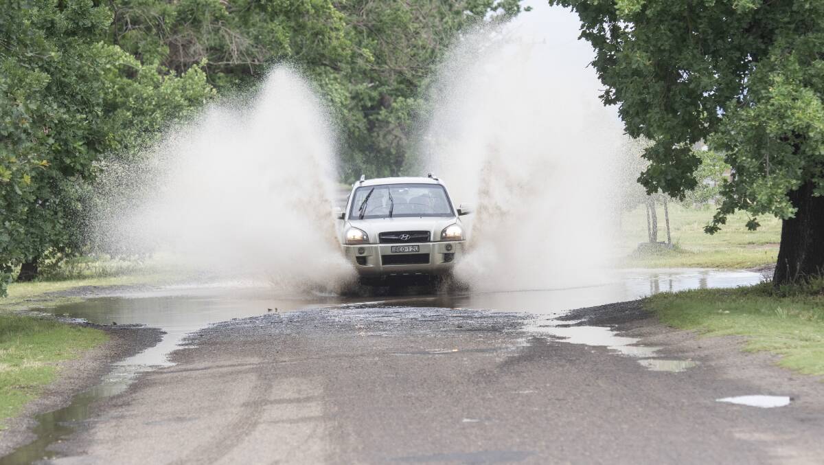 CAREFUL: Drivers were faced with large amounts of water covering roads in the region. Photo: Peter Hardin
