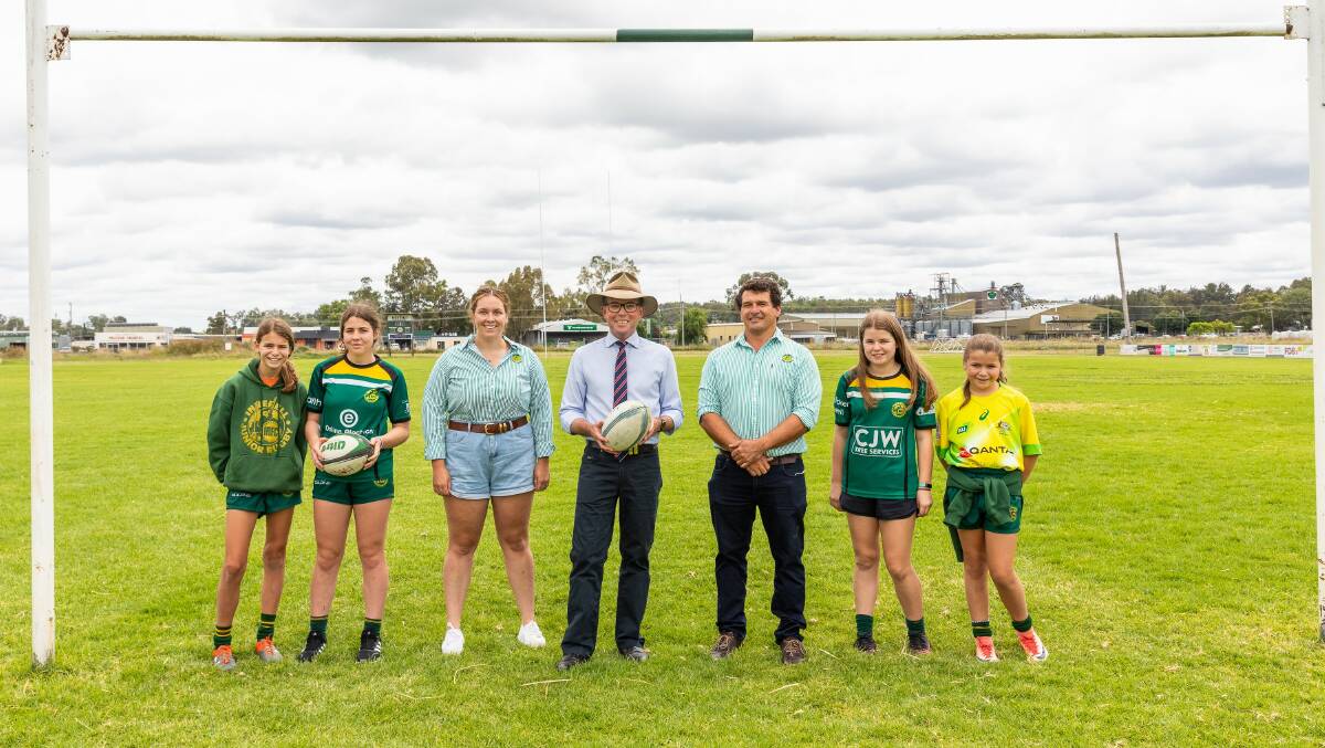 Changing the game: Inverell players Ella Gleeson, Gracy Gleeson, Bonnie Miller, Northern Tablelands MP Adam Marshall, Inverell Rugby Club president Ross Fuller and players Alice Gleeson and Clair Gleeson.