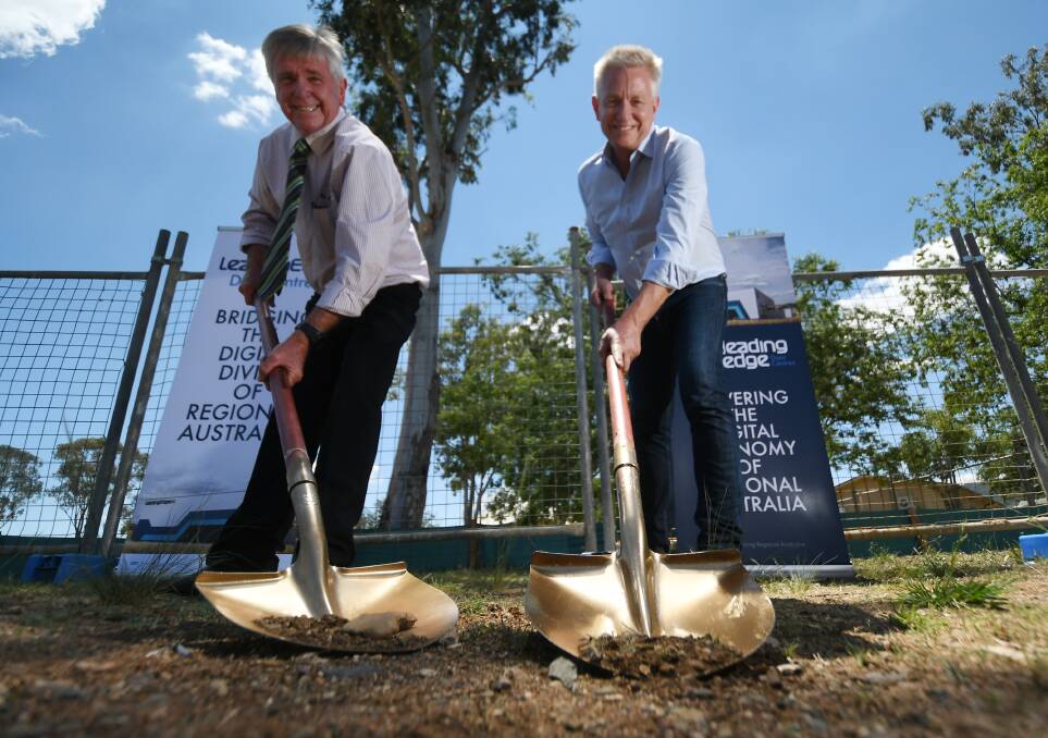 SHOVEL READY: Acting mayor Phil Betts with leady Edge Data Centre's CEO Chris Thorpe turn the first sod in the $5 million centre. Photo: Gareth Gardner