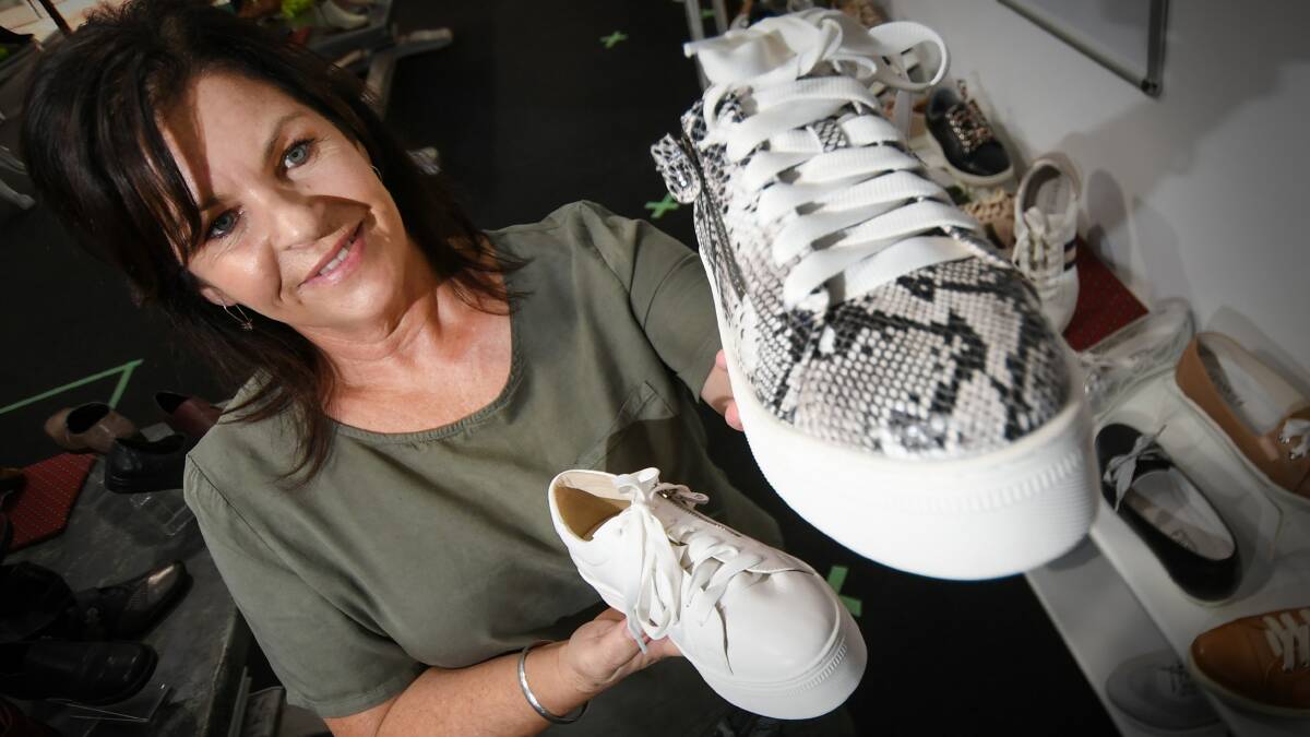 PUMPING UP: Tamworth Easy Living Footwear's Tanya Barnett is seeing their leisure shoes walking off the shelves. Photo: Gareth Gardner
