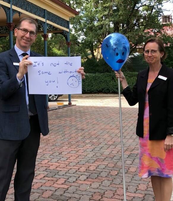NOT THE SAME: As students miss their teachers, the feeling is reciprocated by deputy principal Mark Doran and Head of Secondary Dianne Cameron. Photo: Supplied