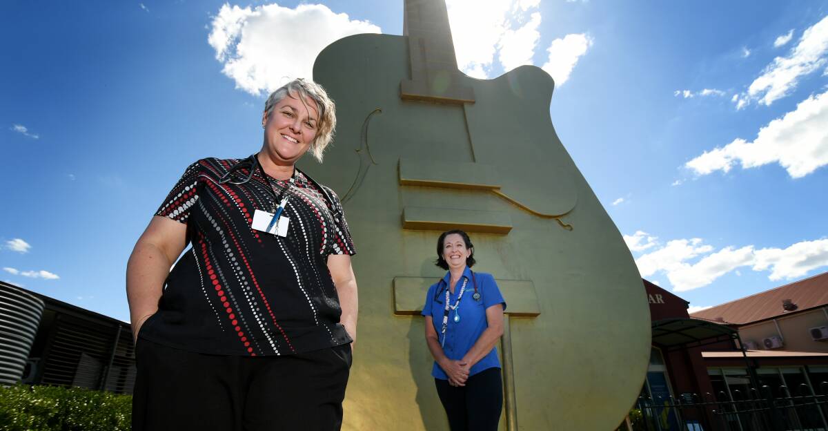 ACCESS: Jo Lavelle and Susan Morris, registered nurses for Integrated Living, spruik the benefits of attending virtual forums for carers and support workers. Photo: Gareth Gardner
