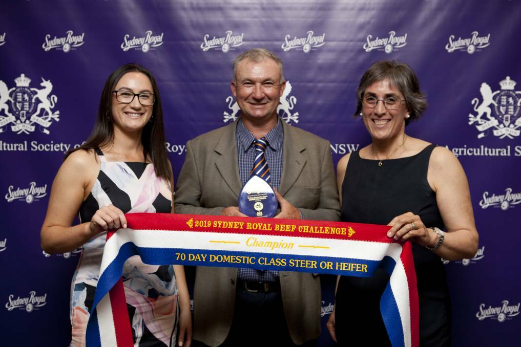 ON TOP: Jen, Jason and Jacqui Impey from Mala-Daki Simmentals, with their award for champion individual carcase in the 70-day class, 2019. Photo: Danni MacCue