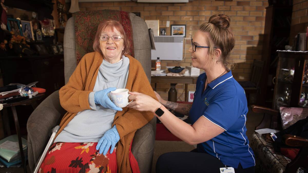 SMILE: Iris Mahony is one of the many clients care worker Jessie-Lee Sanders looks forward to visiting, despite the COVID-19 precautionary measures. Photo: Peter Hardin