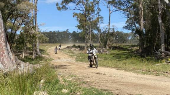 ON YA BIKE: ADV Tours has fallen in love with Nundle, and has plans to bring their tours through the town, giving a welcome boost to their economy. Photo: Supplied