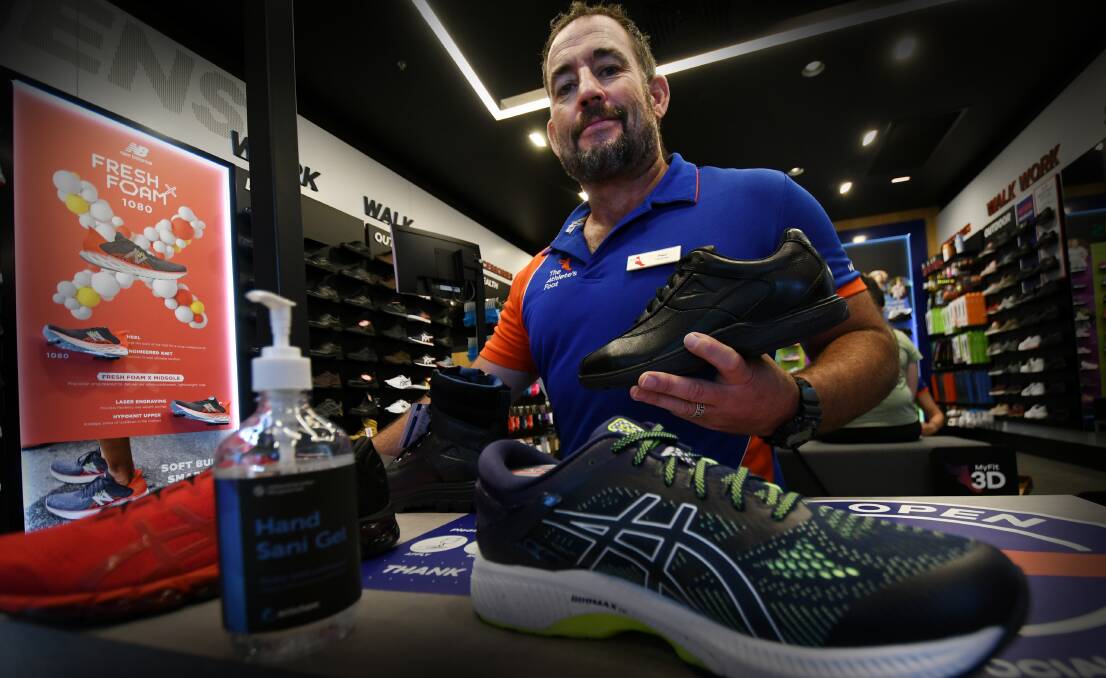 ACTIVE: Paul Lawrence, franchisee of The Athletes Foot in Tamworth, has said many are coming in for runners, with work shoes in high demand as well. Photo: Gareth Gardner